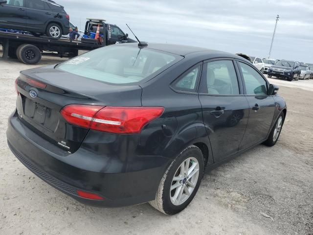 Photo 3 from auction – 2016 FORD FOCUS SE with VIN 1FADP3F25GL266314