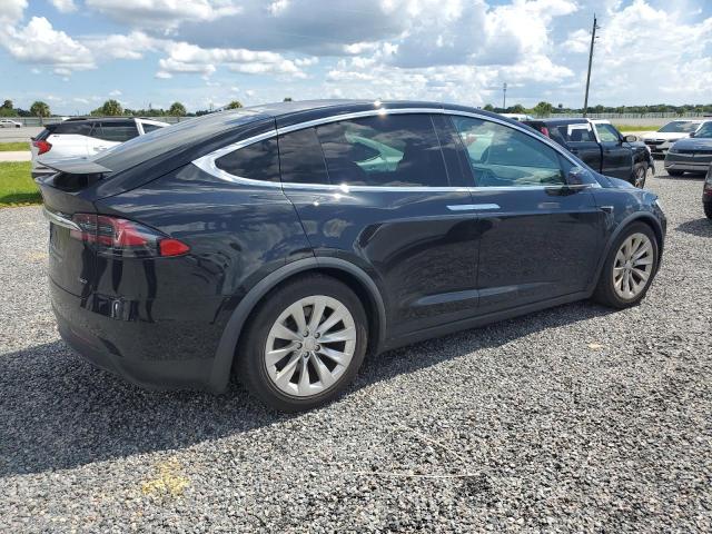 Photo 3 from auction – 2017 TESLA MODEL X with VIN 5YJXCBE22HF054179