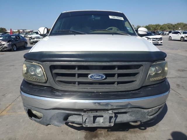 Photo 5 from auction – 2000 FORD F150 with VIN 1FTRX18LXYKA95528
