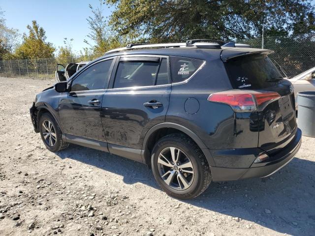 Photo 2 from auction – 2017 TOYOTA RAV4 XLE with VIN 2T3RFREV6HW673073