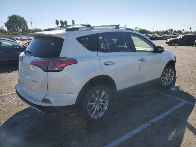 Photo 3 from auction – 2016 TOYOTA RAV4 LIMIT with VIN JTMYFREV4GD085051