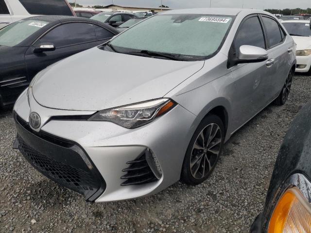 TOYOTA COROLLA L 2019 with VIN 5YFBURHE2KP863473 - Photo from auction