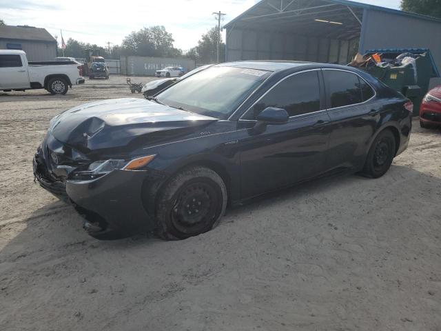 TOYOTA CAMRY LE 2020 with VIN 4T1C31AK5LU537580 - Photo from auction
