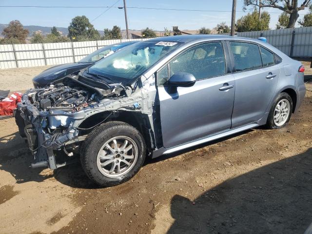 TOYOTA COROLLA LE 2021 with VIN JTDEAMDE5MJ027873 - Photo from auction