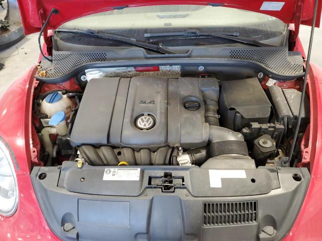 Photo 11 from auction – 2014 VOLKSWAGEN BEETLE with VIN 3VWJX7AT3EM633255