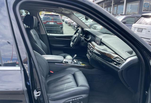 Photo 5 from auction – 2014 BMW X5 XDRIVE3 with VIN 5UXKS4C53E0J93896