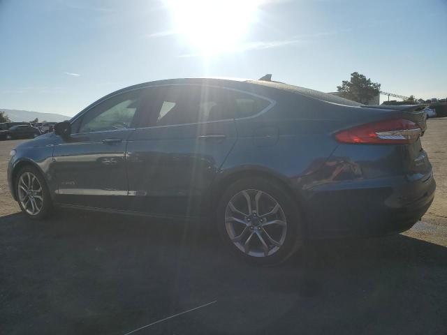 Photo 2 from auction – 2019 FORD FUSION TIT with VIN 3FA6P0RU5KR136113