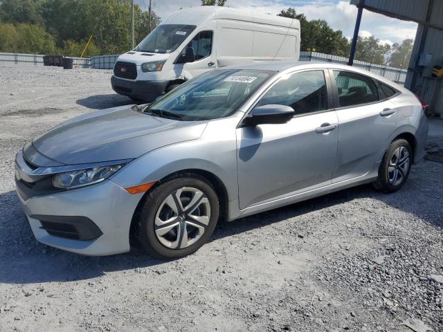 HONDA CIVIC LX 2017 with VIN 19XFC2F51HE226793 - Photo from auction