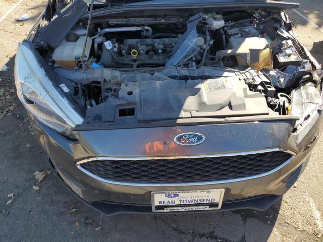 Photo 11 from auction – 2017 FORD FOCUS S with VIN 1FADP3E2XHL323867