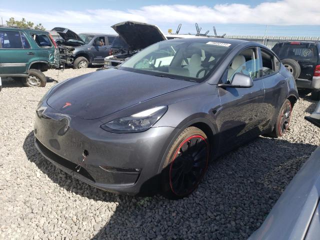 TESLA MODEL Y 2023 with VIN 7SAYGDEF8PF737884 - Photo from auction