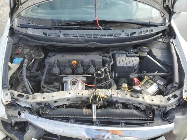 Photo 11 from auction – 2011 HONDA CIVIC LX with VIN 19XFA1F59BE008446