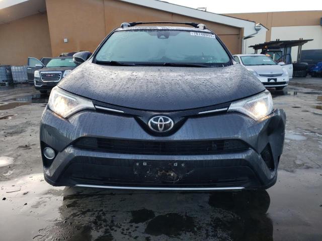 Photo 5 from auction – 2017 TOYOTA RAV4 XLE with VIN JTMRFREV1HD215874