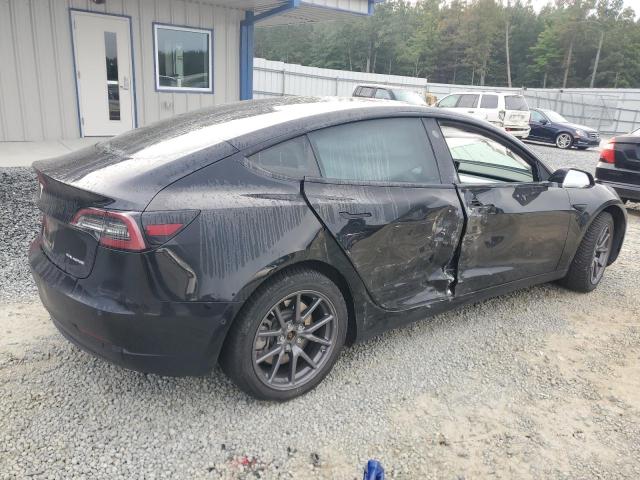 Снимка 3 от търг – 2018 TESLA MODEL 3 с VIN 5YJ3E1EB6JF122816