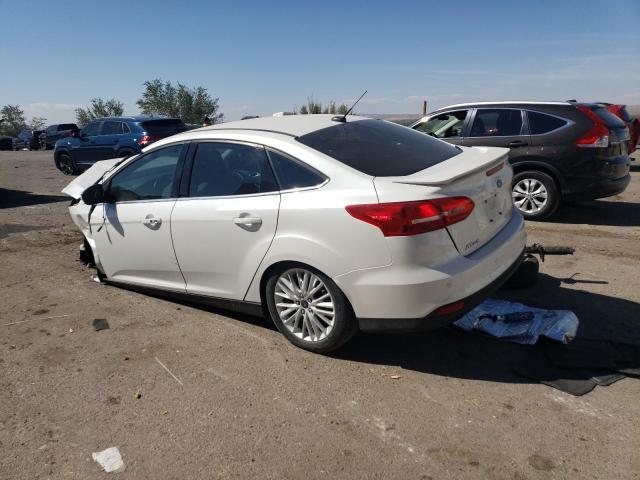 Photo 2 from auction – 2015 FORD FOCUS TITA with VIN 1FADP3J26FL211117