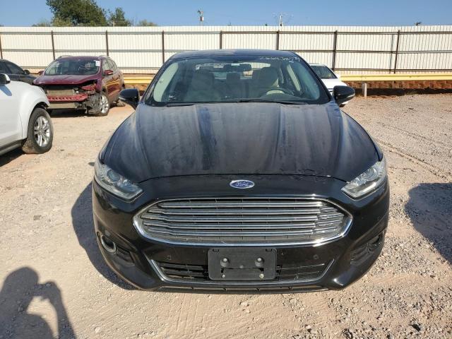 Photo 5 from auction – 2016 FORD FUSION TIT with VIN 3FA6P0RU7GR303806