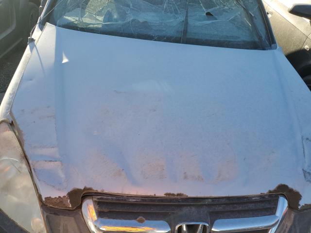 Photo 12 from auction – 2003 HONDA CR-V LX with VIN JHLRD68403C004402