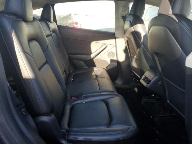 Photo 11 from auction – 2023 TESLA MODEL Y with VIN 7SAYGAEE3PF610563