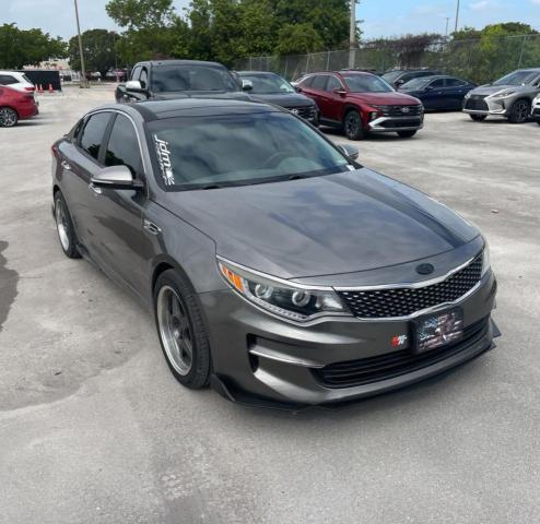 KIA OPTIMA EX 2016 with VIN 5XXGU4L3XGG064877 - Photo from auction