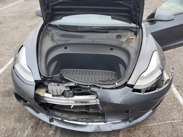 Photo 11 from auction – 2021 TESLA MODEL 3 with VIN 5YJ3E1EA8MF930659
