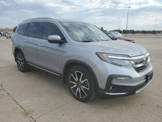Photo 4 from auction – 2020 HONDA PILOT TOUR with VIN 5FNYF5H66LB012750