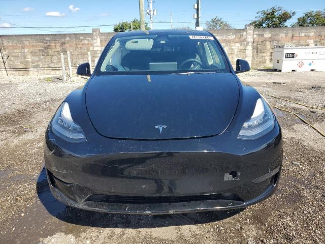 Photo 5 from auction – 2022 TESLA MODEL Y with VIN 7SAYGDEE1NF480796