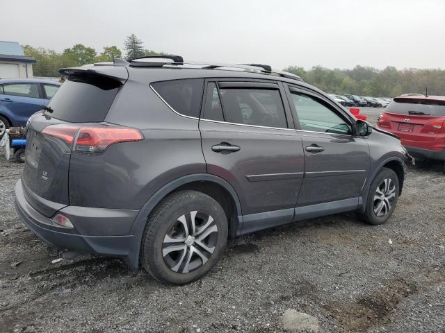 Photo 3 from auction – 2018 TOYOTA RAV4 LE with VIN 2T3BFREV1JW750147