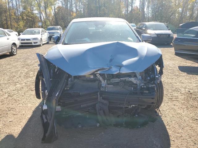 Photo 5 from auction – 2024 TOYOTA COROLLA CR with VIN 7MUCAAAG1RV077360