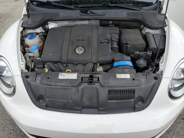 Photo 11 from auction – 2014 VOLKSWAGEN BEETLE with VIN 3VWJX7AT9EM628223