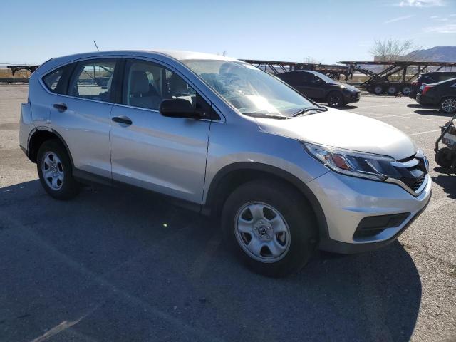Photo 4 from auction – 2015 HONDA CR-V LX with VIN 3CZRM3H33FG701724
