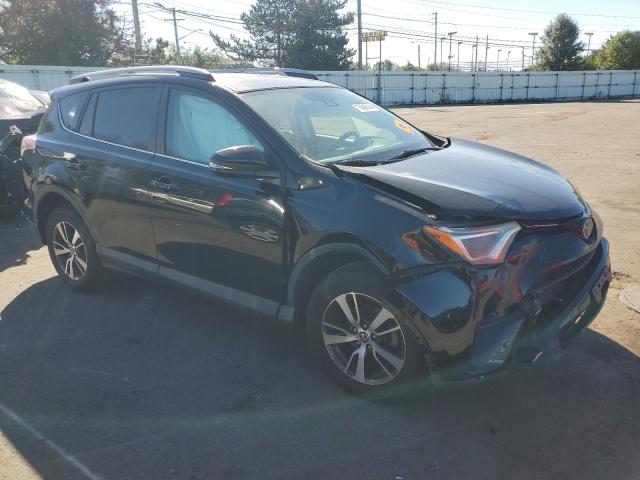 Photo 4 from auction – 2017 TOYOTA RAV4 XLE with VIN 2T3RFREV5HW637892