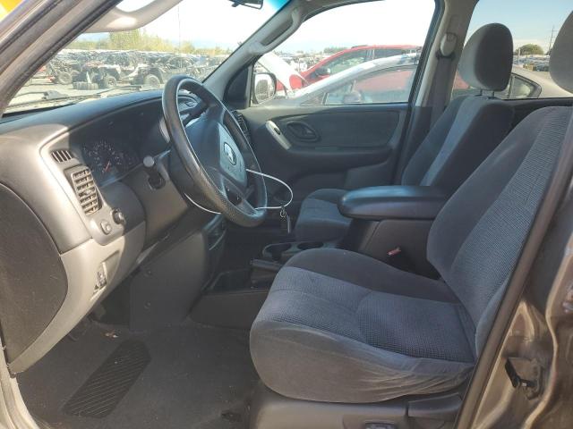 Photo 7 from auction – 2003 MAZDA TRIBUTE LX with VIN 4F2YZ94113KM01856