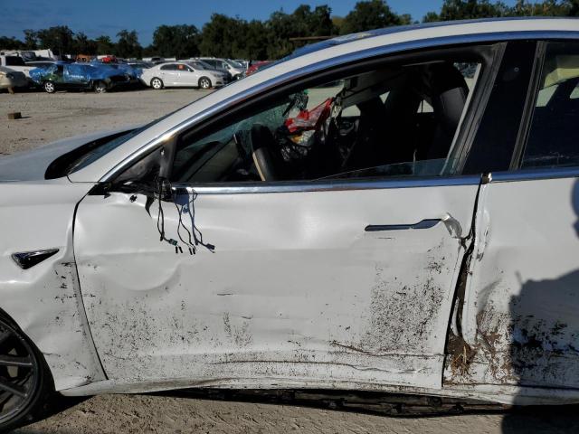 Photo 7 from auction – 2018 TESLA MODEL 3 with VIN 5YJ3E1EA1JF108782