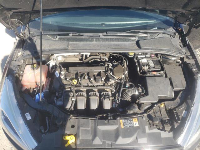 Photo 11 from auction – 2015 FORD FOCUS SE with VIN 1FADP3F29FL257033