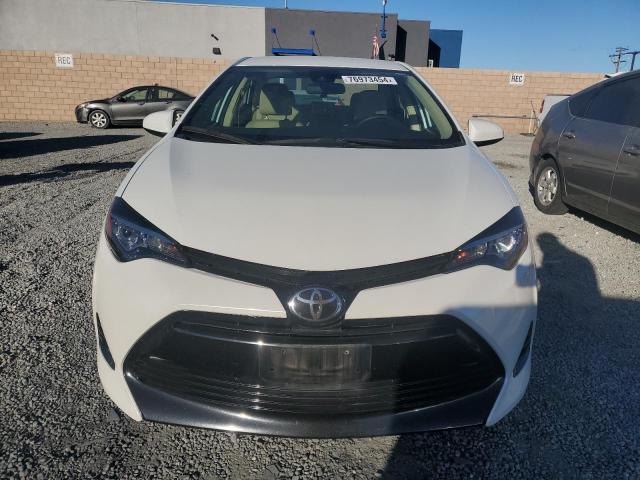 Photo 5 from auction – 2017 TOYOTA COROLLA L with VIN 5YFBURHE3HP736787