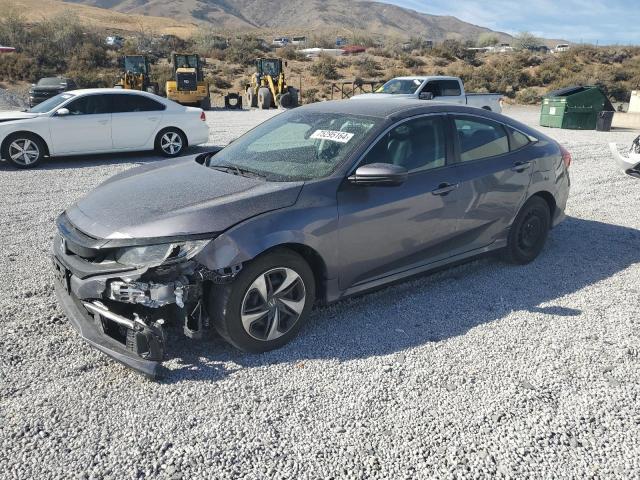 HONDA CIVIC LX 2019 with VIN 19XFC2F60KE203103 - Photo from auction