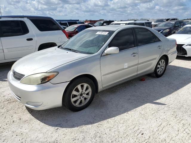 TOYOTA CAMRY LE 2002 with VIN 4T1BE30K52U113978 - Photo from auction