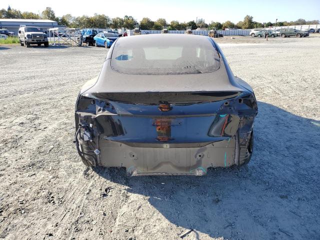 Photo 6 from auction – 2022 TESLA MODEL 3 with VIN 5YJ3E1EB4NF205103