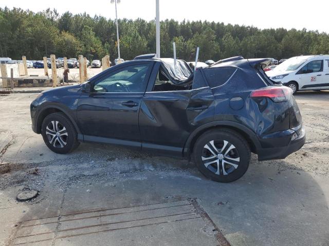 Photo 2 from auction – 2017 TOYOTA RAV4 LE with VIN JTMZFREV0HD094013