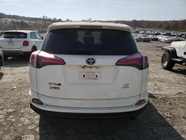 Photo 6 from auction – 2018 TOYOTA RAV4 LE with VIN JTMBFREV6JJ233263