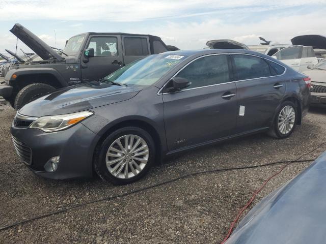 TOYOTA AVALON HYB 2014 with VIN 4T1BD1EBXEU029501 - Photo from auction