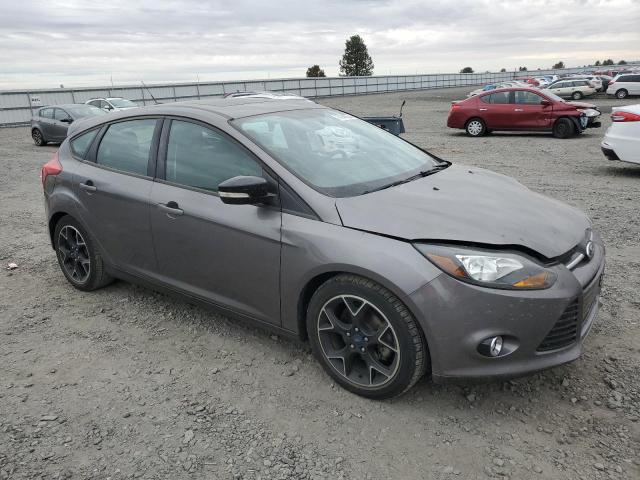 Foto 4 de la subasta – 2014 FORD FOCUS SE con VIN 1FADP3K28EL118970