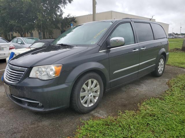 CHRYSLER TOWN & COU 2012 with VIN 2C4RC1CG1CR415884 - Photo from auction