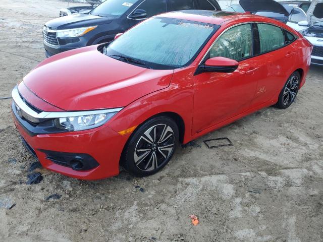 HONDA CIVIC EX 2018 with VIN JHMFC1F35JX039537 - Photo from auction