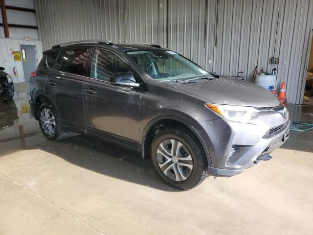 Photo 4 from auction – 2018 TOYOTA RAV4 LE with VIN JTMBFREV0JJ242833