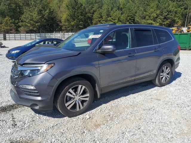 HONDA PILOT EXL 2018 with VIN 5FNYF5H54JB031205 - Photo from auction