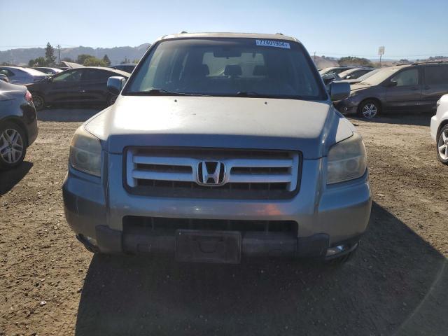 Photo 5 from auction – 2006 HONDA PILOT EX with VIN 2HKYF18596H517087