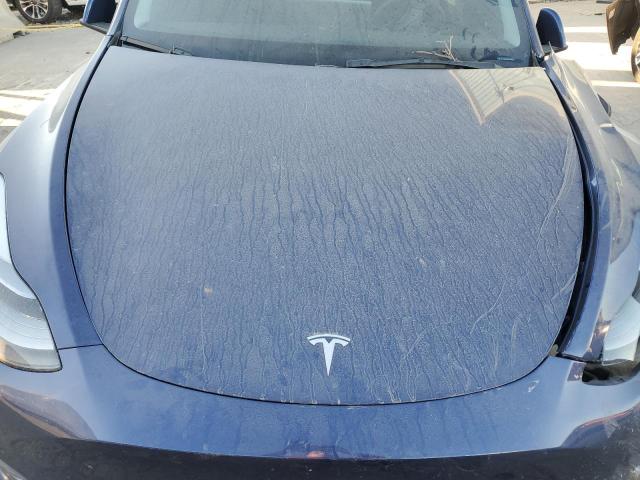 Photo 11 from auction – 2023 TESLA MODEL Y with VIN 7SAYGDEE9PF850699
