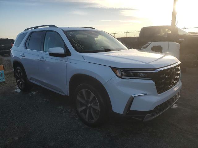 Photo 4 from auction – 2023 HONDA PILOT ELIT with VIN 5FNYG1H84PB047347