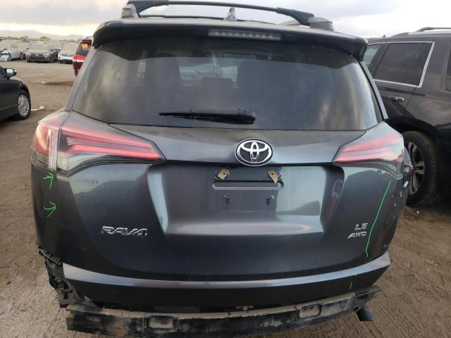 Photo 6 from auction – 2018 TOYOTA RAV4 LE with VIN 2T3BFREV3JW786082