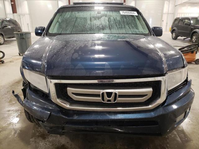 Photo 5 from auction – 2011 HONDA RIDGELINE with VIN 5FPYK1F52BB003628